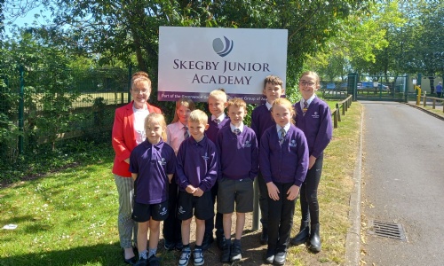 A photo of the Principal, Pauline Marples, with pupils at Skegby Junior Academy